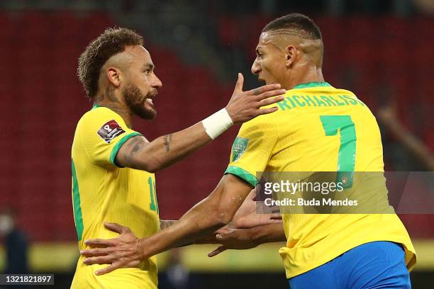 Richarlison of Brazil celebrates after scoring the first goal of his team with Neymar Jr. During a match between Brazil and Ecuador as part of South...