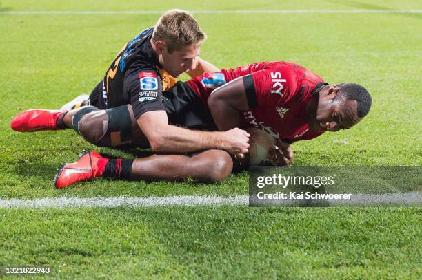 Manasa Mataele of the Crusaders dives over to score a try during the round four Super Rugby Trans-Tasman match between the Crusaders and the Western...