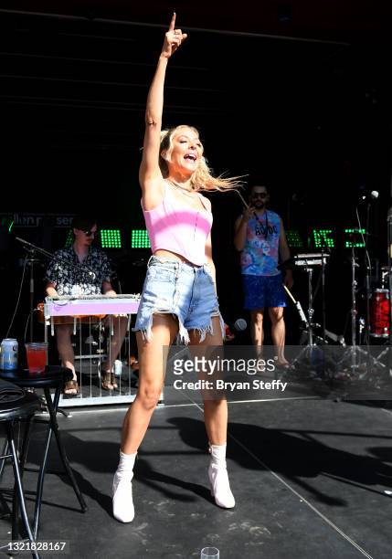 Recording artist MacKenzie Porter performs during the Cowboys & Angels Pool Party as part of the Dustin Lynch Pool Situation: Vegas weekend at the...