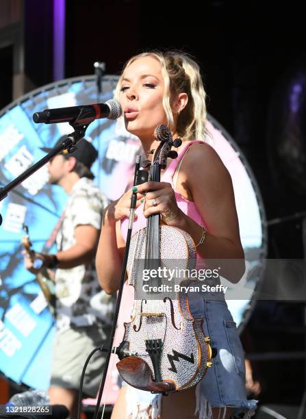 Recording artist MacKenzie Porter performs during the Cowboys & Angels Pool Party as part of the Dustin Lynch Pool Situation: Vegas weekend at the...