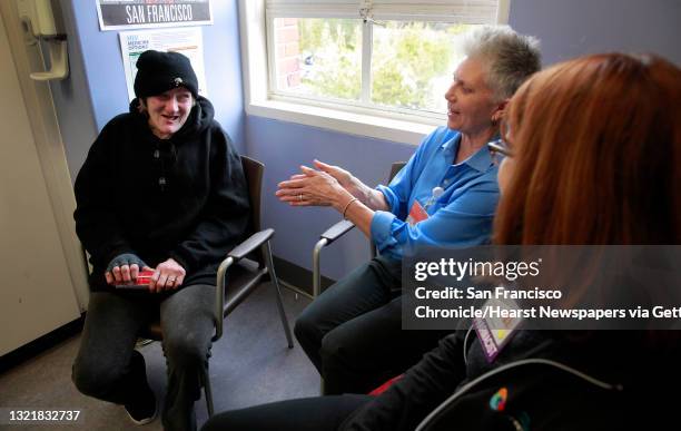 Patient Pamela Phelan, meets with RN Valerie Robb, and pharmacist Janet Grochowski during an appointment in San Francisco Ca. On Thursday Feb. 2,...