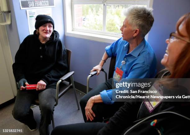 Patient Pamela Phelan, meets with RN Valerie Robb, and pharmacist Janet Grochowski during an appointment in San Francisco Ca. On Thursday Feb. 2,...