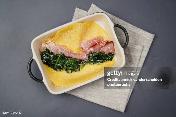 steamed omelet with spinach and ham - crepe textile stock-fotos und bilder