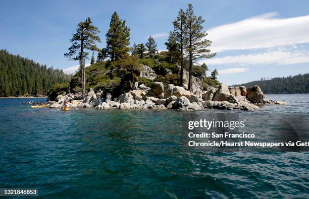 Kayakers pull up to Fanette Island in the middle of Emerald Bay in Lake Tahoe, California on Tuesday Aug. 30, 2016.