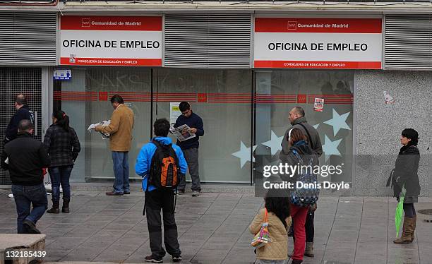 People queue up outside a job center on November 10, 2011 in Madrid, Spain. The current Eurozone debt crisis has left Spain with crippling economic...