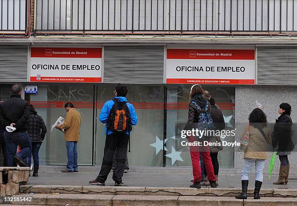 People queue up outside a job center on November 10, 2011 in Madrid, Spain. The current Eurozone debt crisis has left Spain with crippling economic...