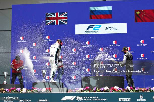 Race winner Robert Shwartzman of Russia and Prema Racing, second placed Dan Ticktum of Great Britain and Carlin and third placed Guanyu Zhou of China...