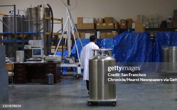 Trans Time,Inc." a Cryonics company of San Leandro, freezes humans and animals in liquid nitrogen. Inside the warehouse company President with a tank...