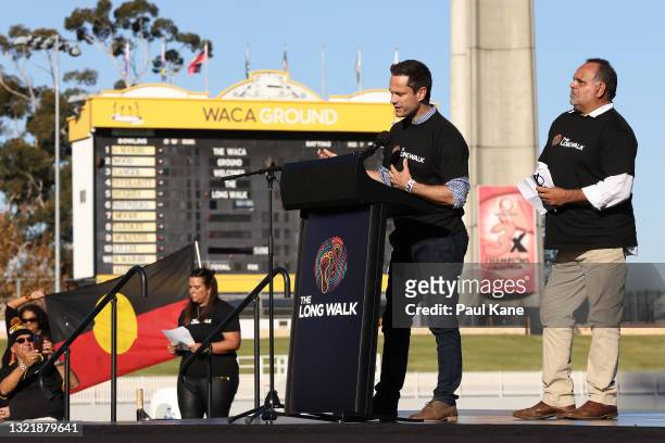 Gavin Wanganeen and Michael Long talk ahead of the Long Walk from the WACA to Optus Stadium during the round 12 AFL match between the Essendon...