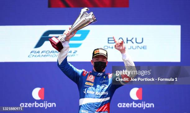 Race winner Robert Shwartzman of Russia and Prema Racing celebrates on the podium after winning the sprint race 1 of Round 3:Baku of the Formula 2...