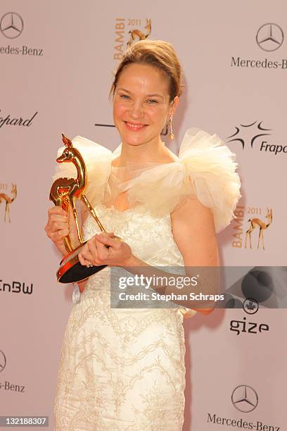 Jeanette Hain poses in front of the winners board during the Bambi Award 2011 ceremony at the Rhein-Main-Hallen on November 10, 2011 in Wiesbaden,...