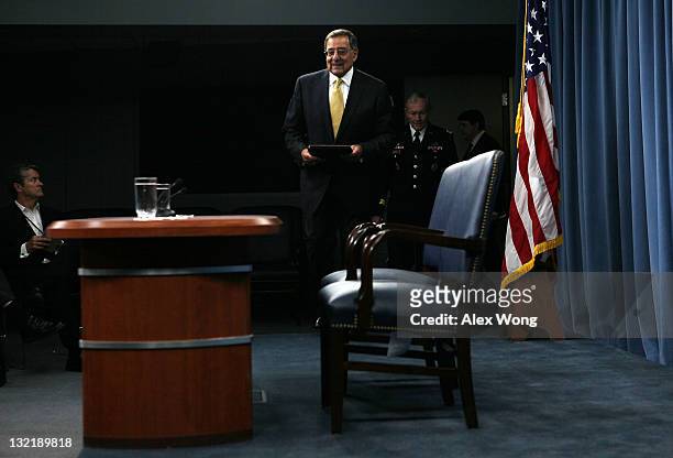 Secretary of Defense Leon Panetta and Chairman and Joint Chiefs of Staff Gen. Martin Dempsey arrive for a press briefing November 10, 2011 at the...