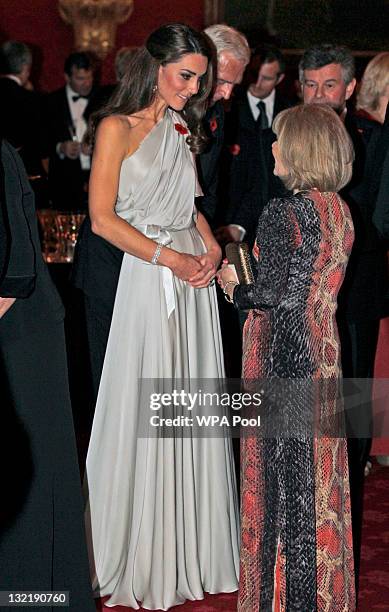 Catherine, Duchess of Cambridge talks to people at a reception in aid of the National Memorial Arboretum Appeal at St James's Palace on November 10,...