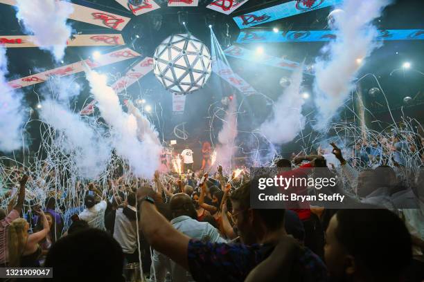 Confetti cannons spray the crowd prior to Wiz Khalifa performing during the grand reopening of Drai’s Beach Club – Nightclub at The Cromwell Las...