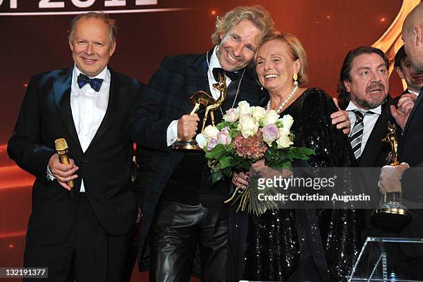 Axel Milberg, Thomas Gottschalk, Ruth-Maria Kubitschek, Armin Rohde and Christian Berkel pose with their award after the Bambi Award 2011 show at the...