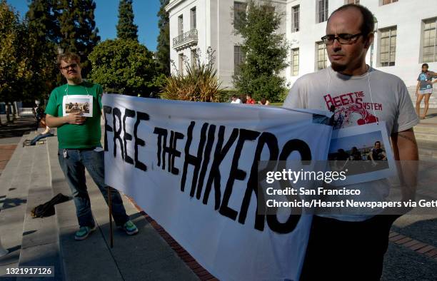 Kermit Playfoot, and Marcus Kryshka, join a handful of supporters during a vigil at Sproul Plaza on the UC Berkeley campus, on Wednesday September 30...