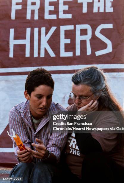 Ayala Rahm, a close friend of Sarah's mom, Nora Shourd, join a handful of supporters during a vigil at Sproul Plaza on the UC Berkeley campus, on...