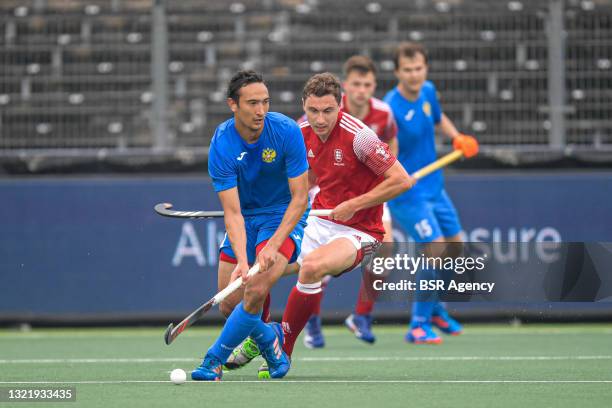 Evgeny Artemov of Russia, Harry Martin of England during the Euro Hockey Championships match between England and Russia at Wagener Stadion on June 5,...