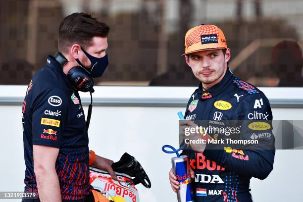 Third place qualifier Max Verstappen of Netherlands and Red Bull Racing looks on in parc ferme during qualifying ahead of the F1 Grand Prix of...