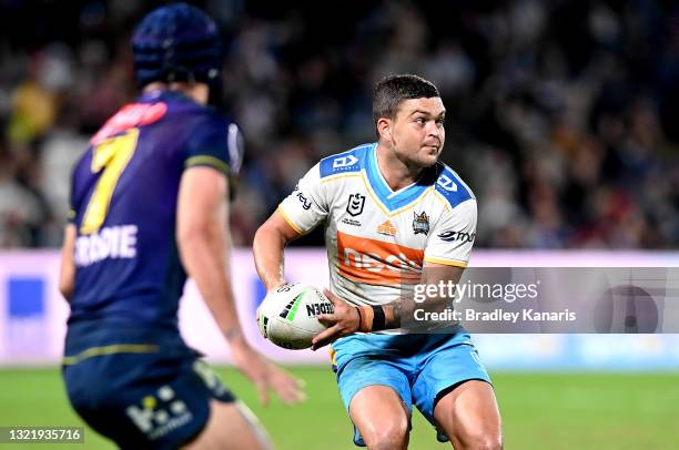 Ashley Taylor of the Titans looks to pass during the round 13 NRL match between the Melbourne Storm and the Gold Coast Titans at Sunshine Coast...