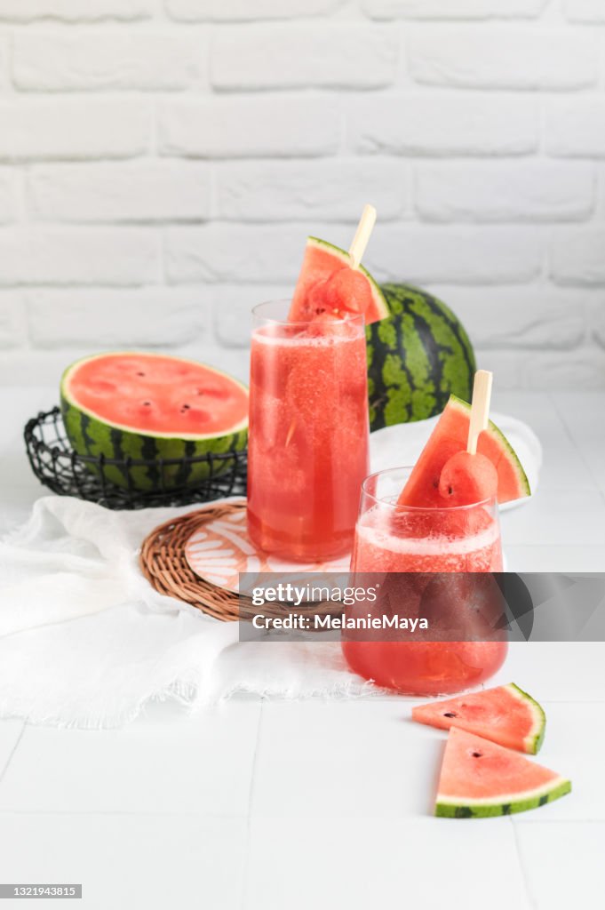 Fresh Watermelon Juice smoothie with fruit melon skewers