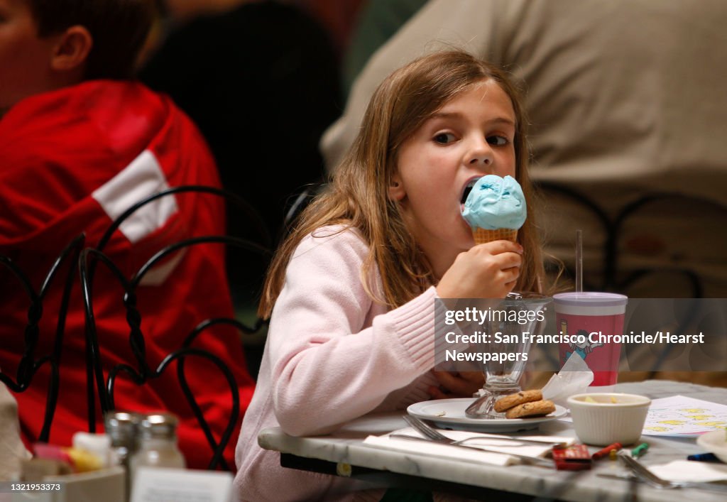 6-year-old Cecily Hayes of Oakland digs into her bubble gum ice cream cone at Fentons Creamery on Piedmont Ave. in Oakland, Calif., on Saturday May 23, 2009. The historic ice cream parlor and restaurant figures prominently into the new Pixar animated fea