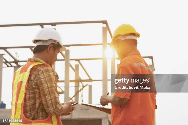 construction - person in suit construction stock pictures, royalty-free photos & images