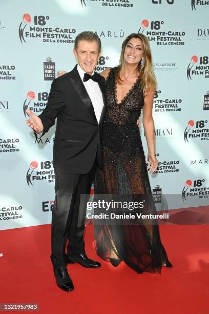 Ezio Greggio and Elisa Isoardi attend the Monte-Carlo Film Festival 2021 at Grimaldi Forum on June 05, 2021 in Monaco, Monaco.