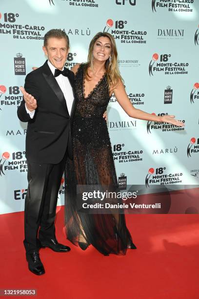 Ezio Greggio and Elisa Isoardi attend the Monte-Carlo Film Festival 2021 at Grimaldi Forum on June 05, 2021 in Monaco, Monaco.