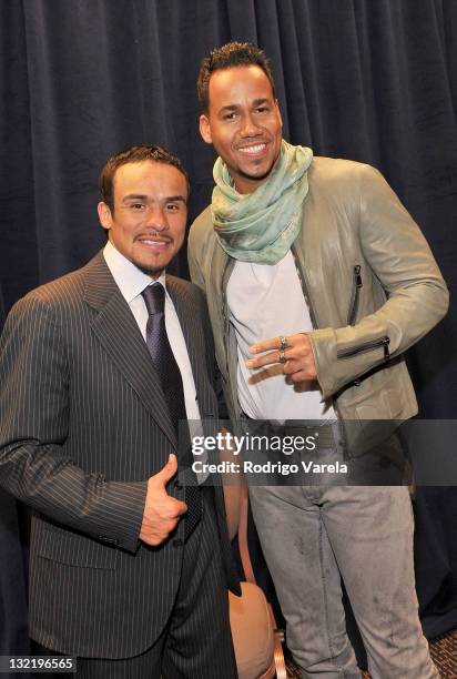 Professional Boxer Juan Manuel Marquez and singer Romeo pose backstage at the 12th Annual Latin GRAMMY Awards held at the Mandalay Bay Events Center...