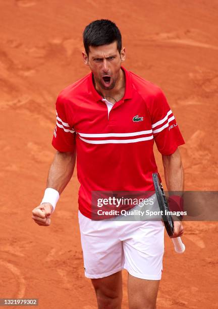 Novak Djokovic of Serbia celebrates a point in his third round match against Ricardas Berankis of Lithuania during day seven of the 2021 French Open...