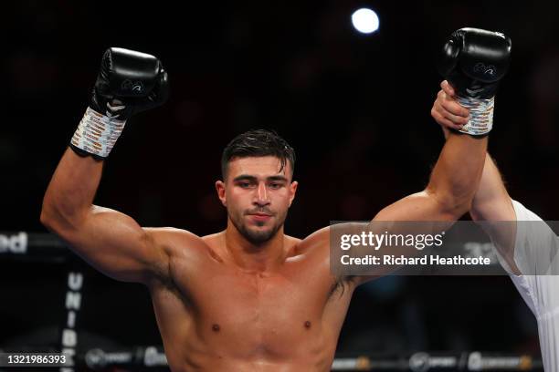 Tommy Fury celebrates after victory in the Light Heavyweight fight between Tommy Fury and Jordan Grant at Telford International Centre on June 05,...