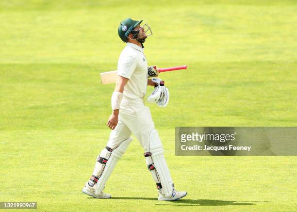 Joe Clarke of Nottinghamshire walks off the pitch dejected after being caught out during the LV= Insurance County Championship match between Essex...