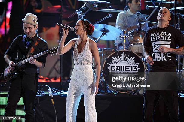 Musician Eduardo Cabra Martonez , singer Ileana aka PG13 and Rene Perez Joglar of Calle 13 perform onstage at the 12th Annual Latin GRAMMY Awards...