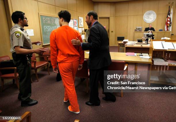 Mark Lugo, is led away with his attorney Douglad Horngrad close by, after entered a guilty plea before Judge James Collins in a San Francisco, Ca....