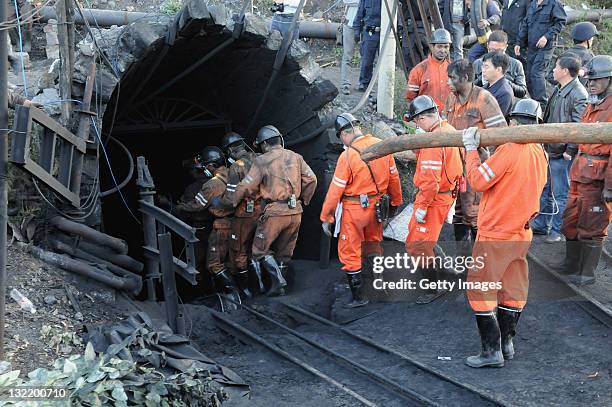Rescuers prepare to enter the Sizhuang Coal Mine to rescue trapped miners on November 10, 2011 in Shizong County, Yunnan Province of China. 20 people...