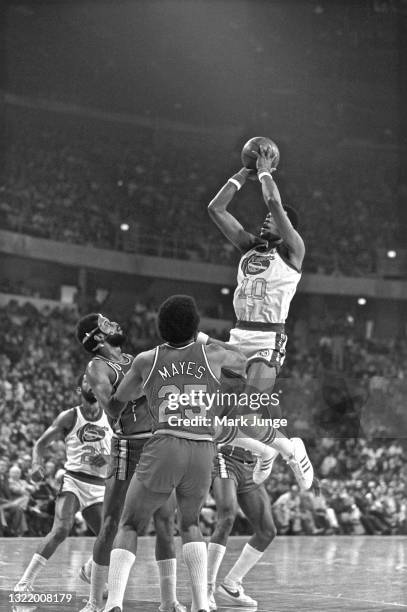 Denver Nuggets center Marvin Webster takes a jump shot from the free throw line during an NBA basketball game against the Portland Trail Blazers at...