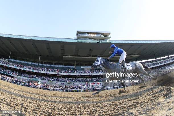 Essential Quality with Luis Saez up wins the 153rd running of the Belmont Stakes at Belmont Park on June 05, 2021 in Elmont, New York.