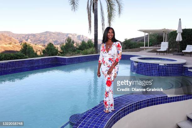 affluent black woman by pool - long dress stock pictures, royalty-free photos & images