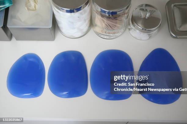 Blue silicone pectoral implants in a blue color and a variety of sizes. Lea Suzuki/ The Chronicle