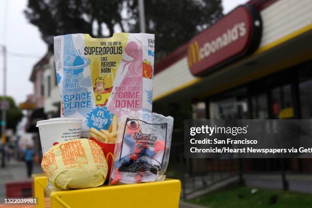 Cheeseburger Happy Meal is seen in San Francisco, Calif. On Tuesday August 10, 2010. Supervisor Eric Mar wants to ban fast food restaurants from...