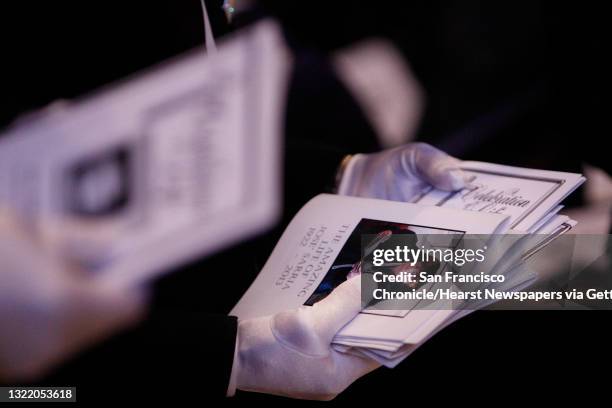 Programs for the funeral for Jose Julio Sarria are handed out before the service at Grace Cathedral on Friday, September 6, 2013 in San Francisco,...