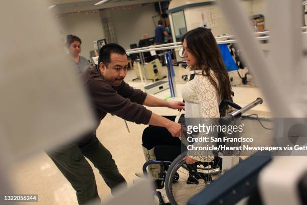 Katy Sharify , who received stem cell therapy before the study she was part of was cancelled, moves between exercise machines in the Cypress...