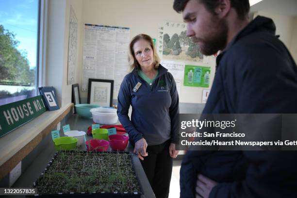 Terri Thomas , the director of conservation, stewardship and research at Presidio Trust, talks with Chris McGuire , nursery intern at the Presidio...