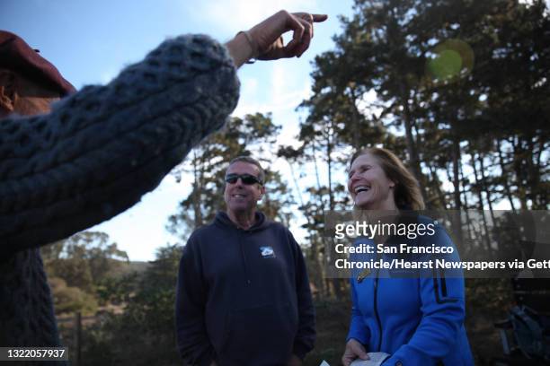 Terri Thomas , the director of conservation, stewardship and research at Presidio Trust, talks with volunteer Charlie Starbuck and Brian Hildebidle ,...