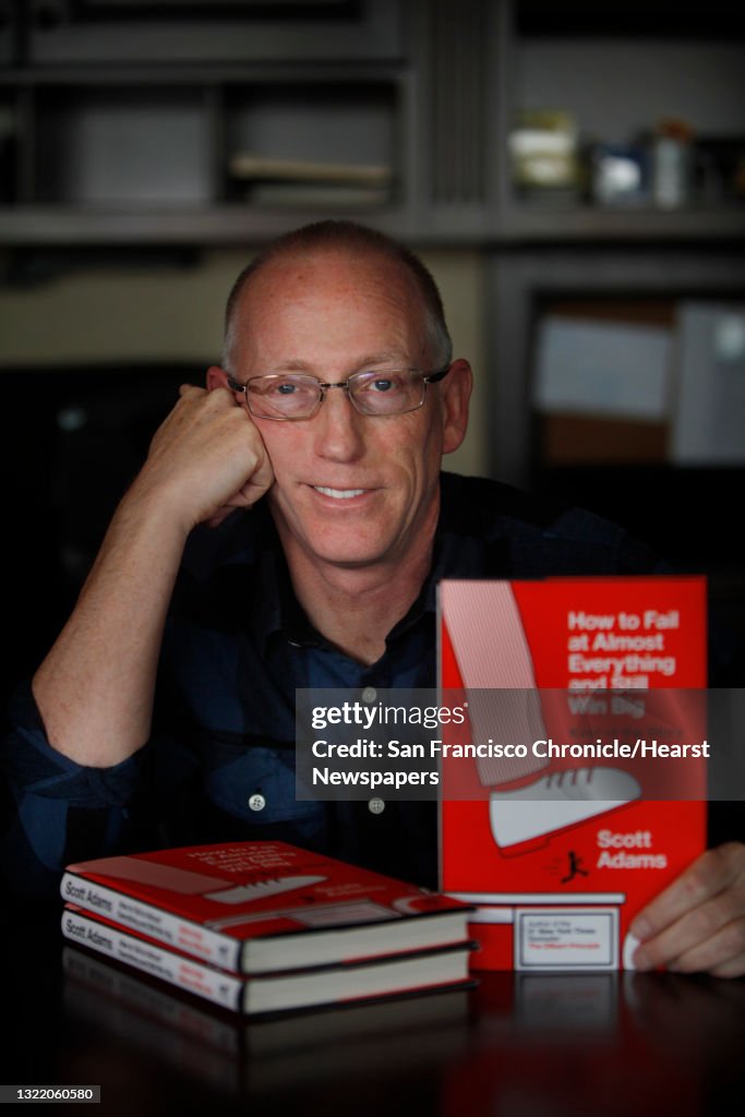 Scott Adams, cartoonist and author and creator of "Dilbert", poses for a portrait in his home office with his new book "How to Fail at Almost Everything and Still Win Big: Kind of the Story of My Life" on Monday, January 6, 2014 in Pleasanton, Calif