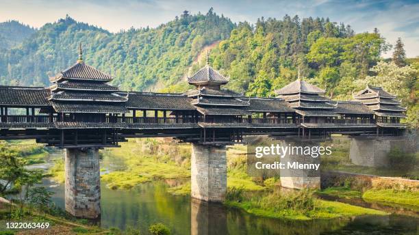 yongji bridge summer sunrise panorama chengyang bridge guangxi china - guangxi zhuang autonomous region china stock pictures, royalty-free photos & images