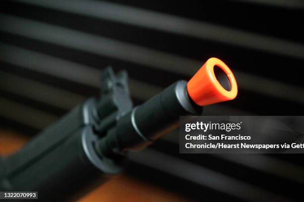 An orange tip is seen on an airsoft gun at Thirty First Outfitters on Friday, October 25, 2013 in Cotati, Calif.