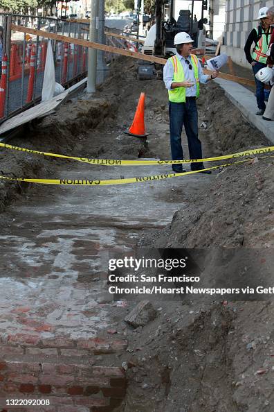 Edward Yarbrough, ICF International senior architectural historian, stands at the site where materials believed to the foundation of the original San Francisco City Hall that collapsed during the earthquake and fire of 1906 were discovered during landscap