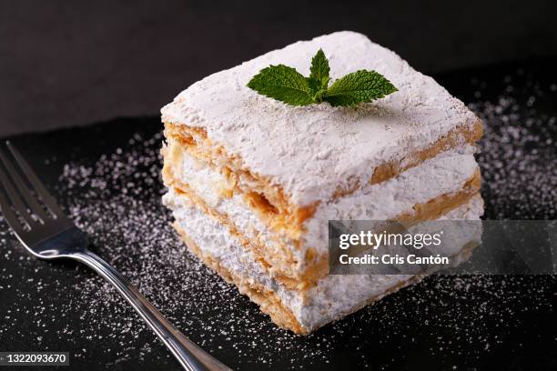 mille-feuille with meringue - millefeuille stock-fotos und bilder